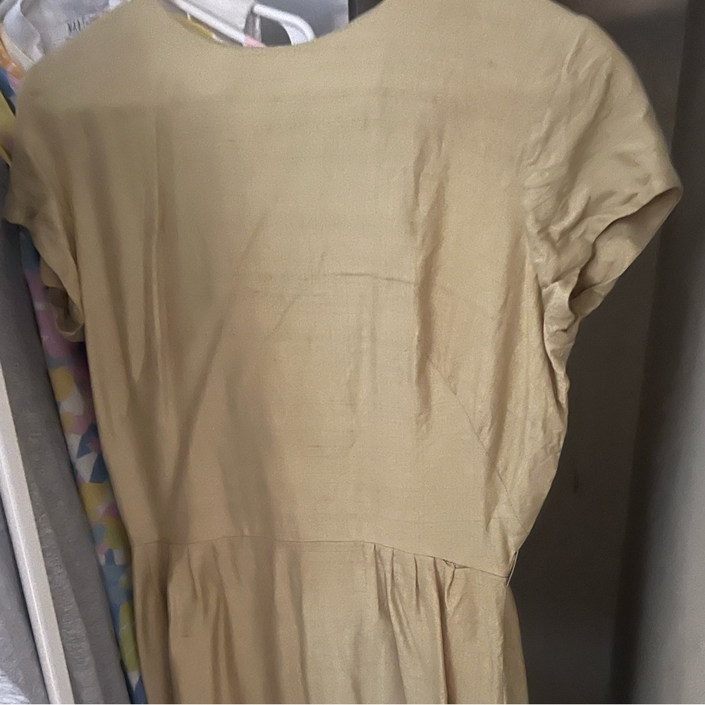 Vintage gold dress. Bought new and used few times. Good condition.